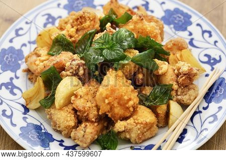 Taiwanese popcorn chicken with fried basil, and you can usually choose other ingredients to get deep fried, and mixed together, like garlic, basil, broccoli, green beans etc.