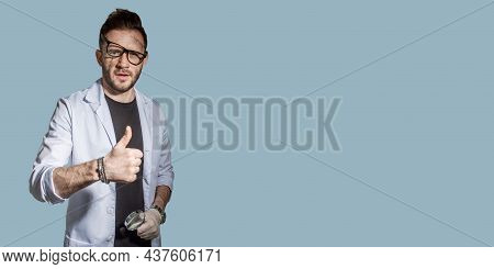Doctor In A White Coat With A Magnifying Glass. Concept-search For Medicines, Vaccines, And Vaccinat