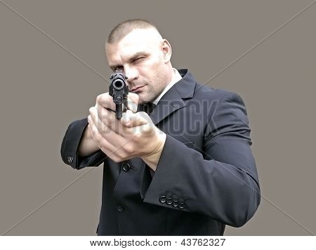 Muž s pistolí