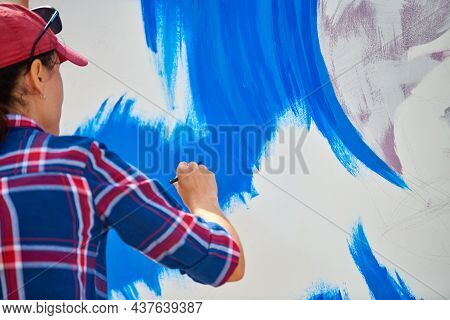 Talented Female Artist Painting On Wooden Canvas Working On Modern Abstract Oil Painting At Festival
