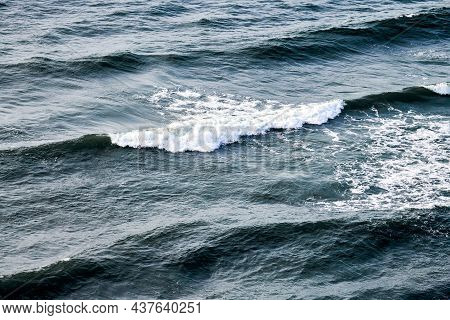 Deep Blue Sea Waters Splashing With Foamy Waves. Aerial View Of Ocean Splashing Waves, Dark Blue Wav