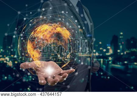 Double Exposure Of Businessman Hand Holding The Particle Earth With Technology Network Circle Over T