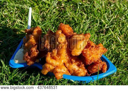 Portion Of Diep-fried Cod Fish Pieces Served With Remoulade Sauce