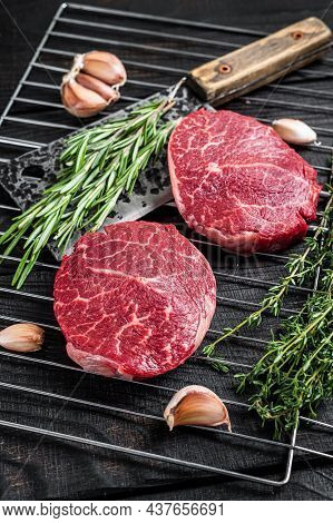 Grill Bbq - Raw Fillet Mignon Beef Steaks With Herbs. Black Wooden Background. Top View