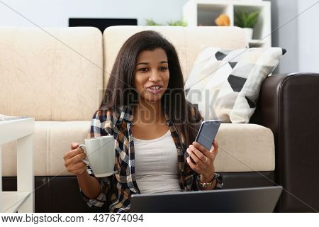 Portrait Of Woman Surprised With End Of Movie, Watching Film Online On Website, Open Laptop On Lap. 