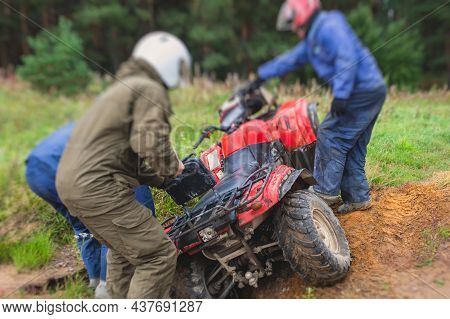 Group Of Riders Riding Atv Vehicle On Off Road Track, Process Of Driving Atv Vehicle, All Terrain Qu