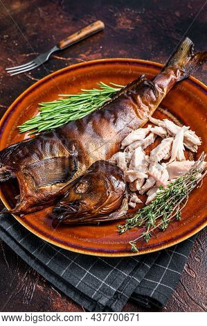 Fillet Of Hot Smoked Fish Perch In A Rustic Plate With Thyme. Dark Background. Top View