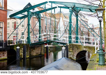 Cityscape Of Leiden, The Netherlands. View Of New Rhine River And Dutch Houses.