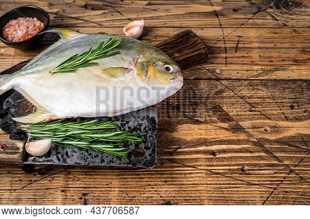 Raw Fish Sunfish Or Pompano On A Wooden Board. Wooden Background. Top View. Copy Space