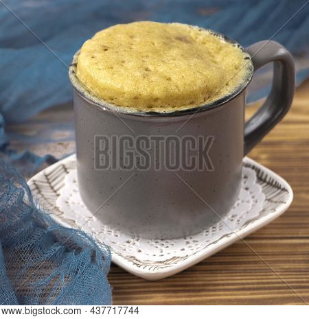 Vanilla Mugcake Is Microwaved. Homemade Cupcake In A Coffee Mug.