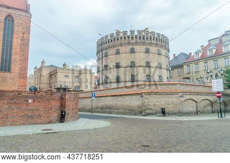 Torun, Poland - July 26, 2021: Brick Wall And Tower Of Panopticon Prison In Torun.