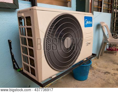 Klang, Malaysia: October 26, 2021- Air Conditioner On Wall Outside The House