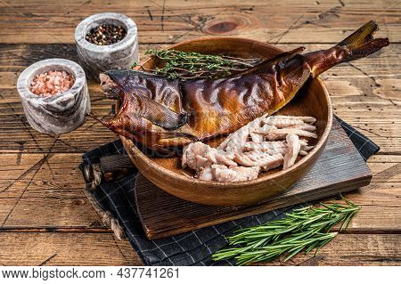Fillet Of Hot Smoked Fish Pike Perch Or Zander In A Wooden Plate With Herbs. Wooden Background. Top 