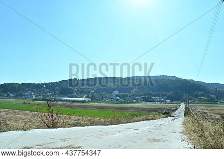 A Clear Sky And A Long Rural Road
