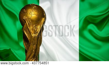 October 6, 2021, Abuja, Nigeria. Fifa World Cup On The Background Of The Flag Of Nigeria.