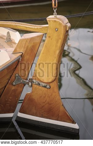 Detail Of A Wooden Sailboat. Here The Rudder Of The Boat.