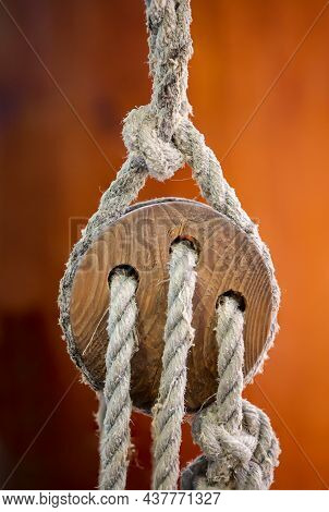 A Detail Of A Sailboat. Here A So-called Three-holed Maiden, Rope Pulley.