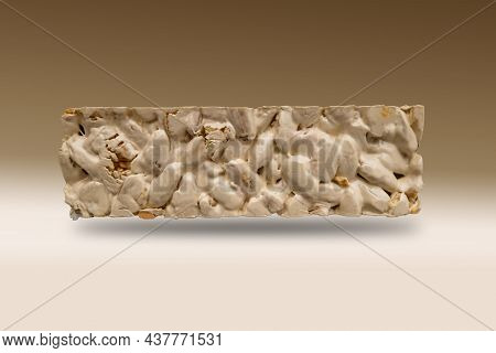 Christmas Nougat View On Brown Gradient Background.