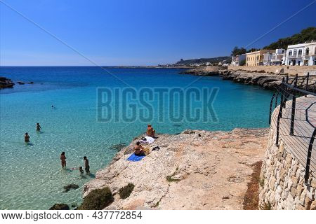 Apulia, Italy - May 30, 2017: Beachgoers Visit Santa Maria Al Bagno Beach In Puglia Region, Italy. W