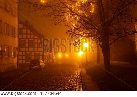 Klaipeda, Lithuania - 01 01 2021: Foggy New Year Night In The City. Ships And Yachts Silhouettes In 