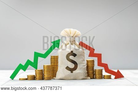 Money Bag With Daollar Sign. Graph Is Growing Green Arrow Up And Graph Of Falling Red Arrow Down On 