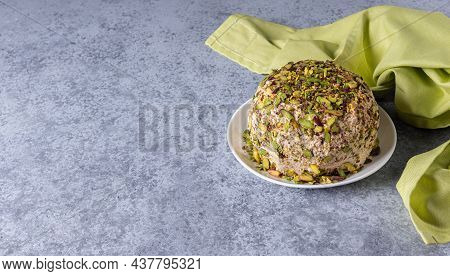 Sesame Halva With Pistachios Nuts On Gray Background With Green Linen Napkin On Side And Large Copy 
