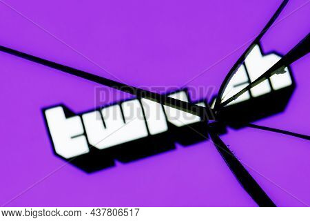 Kazan, Russia - Oct 28, 2021:  Logo Of The Twitch Live Streaming Service In The Reflection Of A Brok