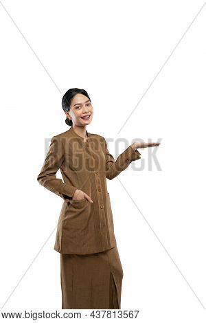 Confident Young Civil Servant Woman Wearing Uniform While Standing Presenting