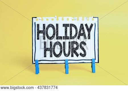 Sign Displaying Holiday Hours. Word Written On Employee Receives Twice Their Normal Pay For All Hour