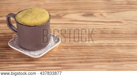Vanilla Mugcake Is Microwaved. Homemade Cupcake In A Coffee Mug.