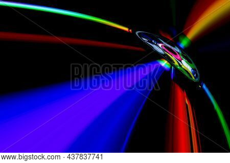 Colorful Reflections Of Lights On A Black Background