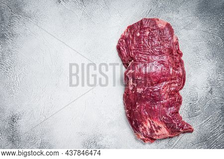 Raw Organic Flank Bavette Or Flap Beef Steak. White Background. Top View. Copy Space