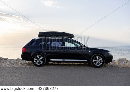 Zarar, Croatia - July 28, 2021: Travelers Car Audi A6 On The Seashore In The Evening.