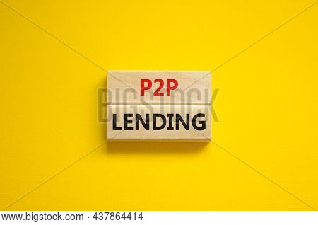 P2p Peer To Peer Lending Symbol. Concept Words P2p Lending On Wooden Blocks On A Beautiful Yellow Ba