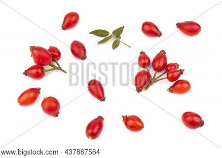 The Rosehip Isolated On White Background. Fresh Raw Berries With Leaves.