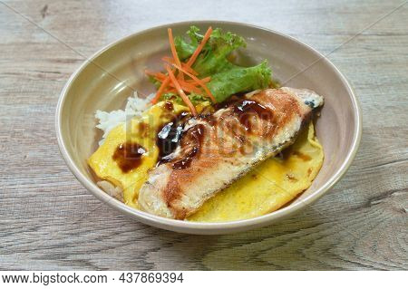 Grilled Salmon With Egg Dressing Teriyaki Sauce Topping On Japanese Rice In Bowl