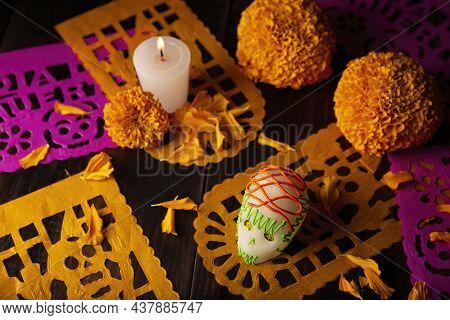 Sugar Skull With Candle, Cempasuchil Flowers Or Marigold And Papel Picado. Decoration Traditionally 