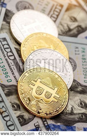 Golden Bitcoin Lies On The Banknotes.new Virtual Money. Crypto Currency Top View. Real Coins Of Bitc