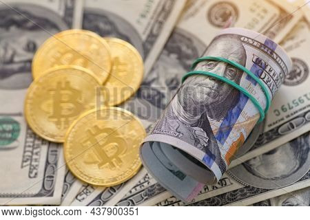 Golden Bitcoin Lies On The Banknotes.new Virtual Money. Crypto Currency Top View. Real Coins Of Bitc