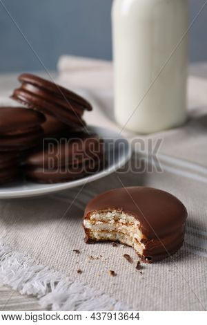 Tasty Choco Pies And Milk On White Wooden Table