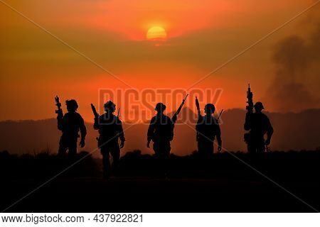 The Silhouette Of A Military Soldier With The Sun As A Marine Corps For Military Operations