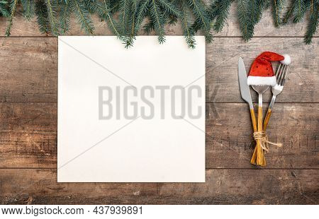Vintage Silverware On Rustic Wooden Background With Christmas Decoration. Christmas Menu. New Year E