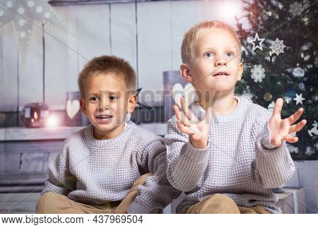 Twin Boys At Home At Christmas Parties