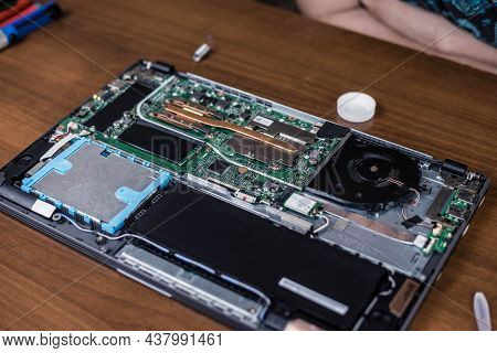 Disassembled Laptop On The Engineer's Desk. Laptop Before Repair. Computer Equipment Repair Shop
