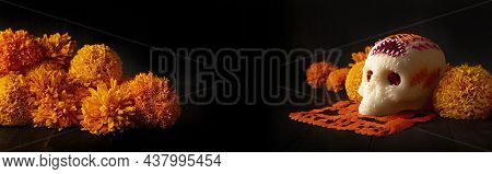 Sugar Skull With Cempasuchil Flowers Or Marigold And Papel Picado. Decoration Traditionally Used In 