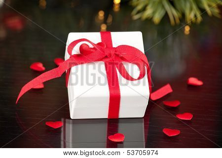Gift With Red Ribbon With Hearts