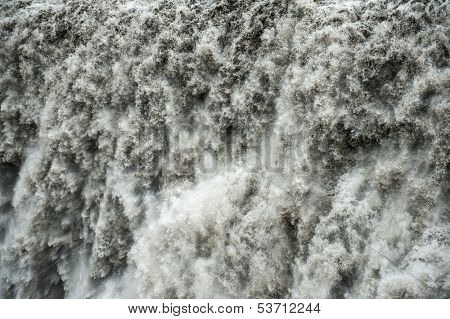 Detail of water from Detifoss waterfall. Dettifoss is the most powerful waterfall on Iceland and in the whole Europe.