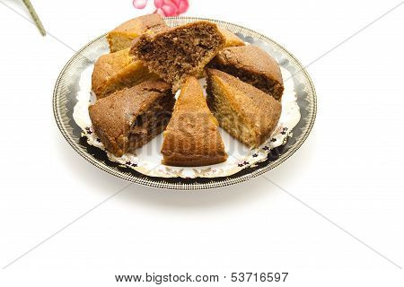 Fresh Baked Brown Cake on Plastic Plate