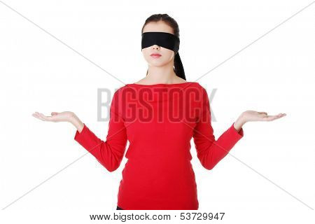 Attractive cheerful girl with band on eyes. Isolated on white. 