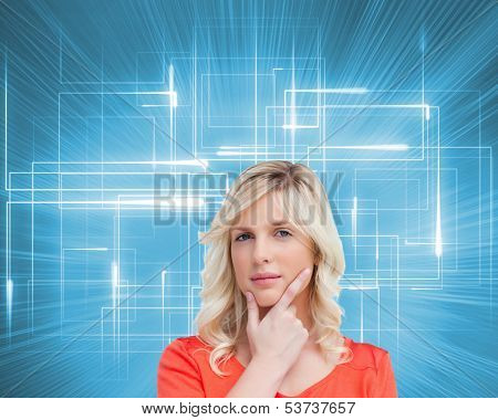 Composite image of teenager standing upright thoughtfully with her fingers on her chin 